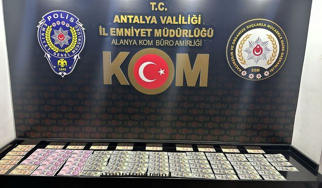 Antalya'da piyasaya sahte para sürdükleri iddiasıyla 2 zanlı tutuklandı