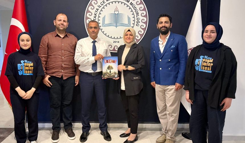 Hasbihal Dergisi İlçe Milli Eğitim Müdürü Tecimen’e Takdim Edildi